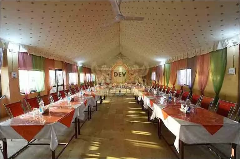 Conference hall set up with long tables