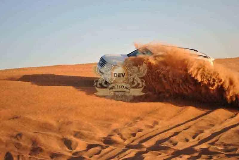 Sand spraying from a 4x4