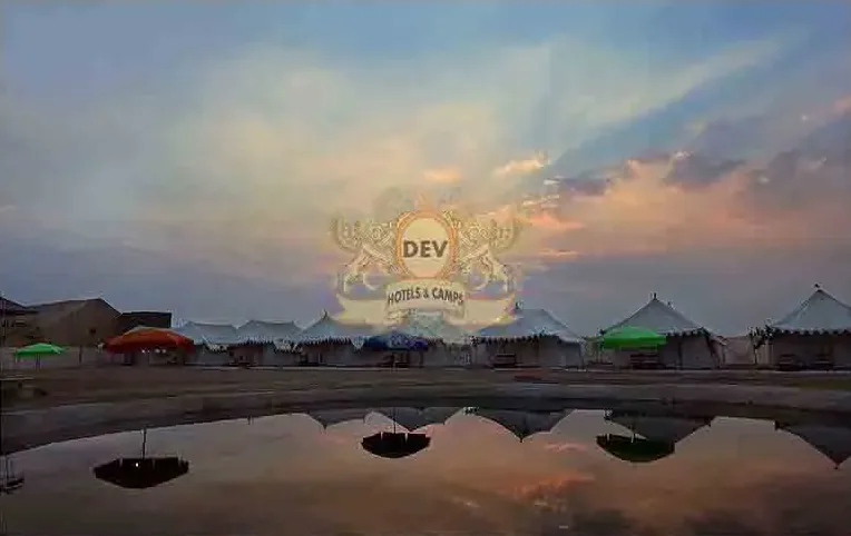 Tents reflected in the Talai pond at twilight