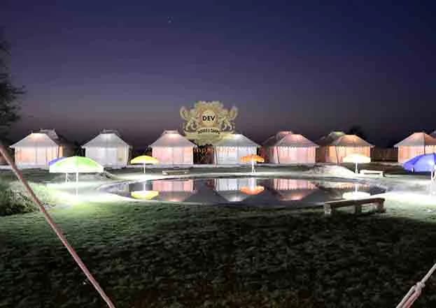 Tents around the Talai pond at dusk