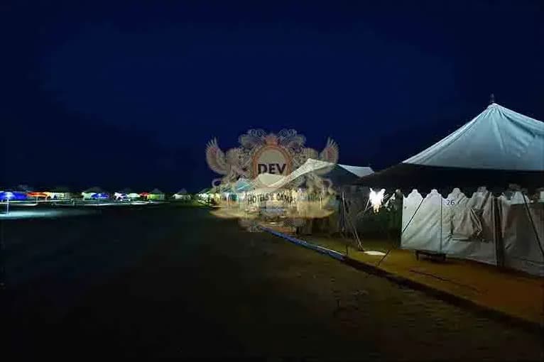 Tents under a night sky