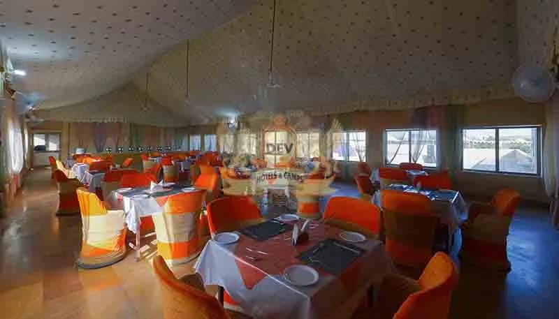 The restaurant with tables laid for dinner